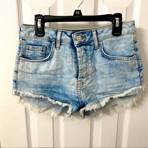 High waisted shorts with distress and fraying